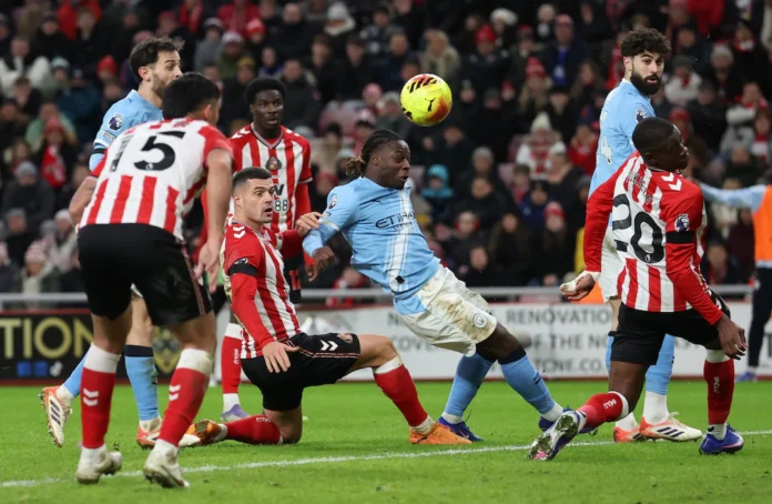 Soccer Football - Premier League - Sunderland v Manchester City - Stadium of Light, Sunderland, Britain - January 1, 2026 Manchester City's Jeremy Doku shoots at goal REUTERS/Scott Heppell