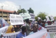 Protest Erupts at Abuja Court Over Move to Delist Opposition Parties