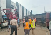 Two Injured, Four Escape Unhurt As Trailer Falls Off Nkpor Bridge In Anambra