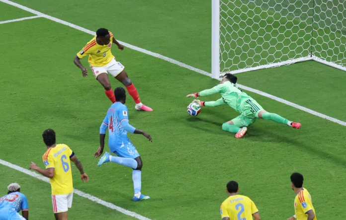 Soccer Football - FIFA World Cup 2026 - Group K - Colombia v DR Congo - Estadio Guadalajara, Guadalajara, Mexico - June 23, 2026 Colombia's Jhon Lucumi and Camilo Vargas in action REUTERS/Raquel Cunha