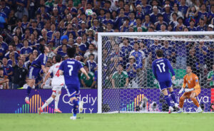Japan's Ayase Ueda scores their fourth goal against Tunisia on Sunday. (Photo: Reuters) Please credit and share this article with others using this link: https://www.bangkokpost.com/sports/3274225/japan-rout-tunisia-40-in-world-cups-1000th-match. View our policies at http://goo.gl/9HgTd and http://goo.gl/ou6Ip. © Bangkok Post PCL. All rights reserved.