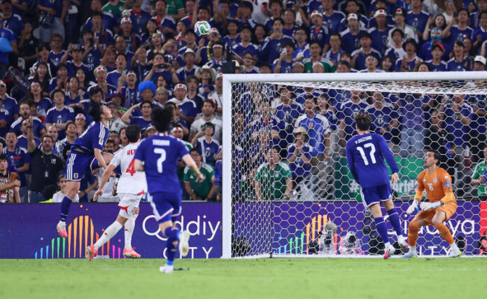 Japan's Ayase Ueda scores their fourth goal against Tunisia on Sunday. (Photo: Reuters) Please credit and share this article with others using this link: https://www.bangkokpost.com/sports/3274225/japan-rout-tunisia-40-in-world-cups-1000th-match. View our policies at http://goo.gl/9HgTd and http://goo.gl/ou6Ip. © Bangkok Post PCL. All rights reserved.