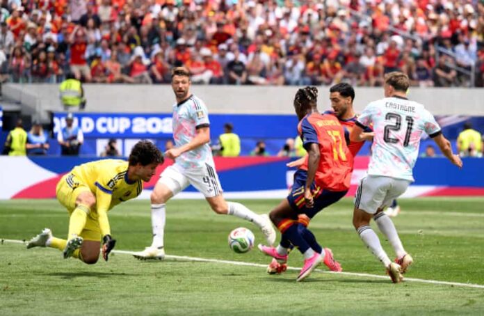 Mikel Merino reacts quickest and tucks the ball home to give Spain the lead. Photograph: David Ramos/Getty Images