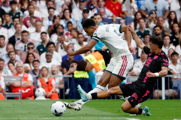 ] Soccer Football - LaLiga - Real Madrid v Malaga - Estadio Bernabeu, Madrid, Spain - August 30, 2026 Real Madrid's Jude Bellingham scores their first goal REUTERS/Thomas Peter